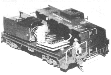 A Bev-Bel Athern wide vision caboose with a battery operated flashing warning light under the end of the roof.